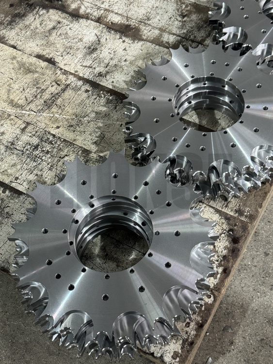 Was ist die Hauptfunktion eines Kettenrads in mechanischen Geräten?